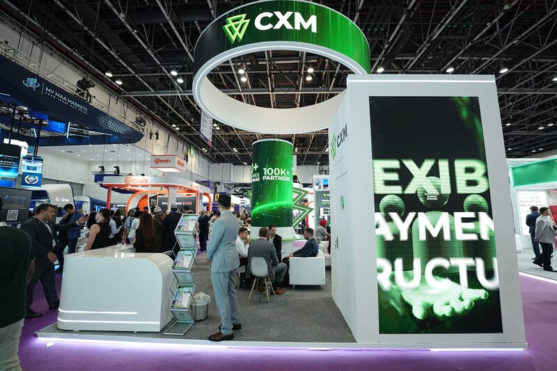 CXM exhibition booth showcasing payment and trading infrastructure
